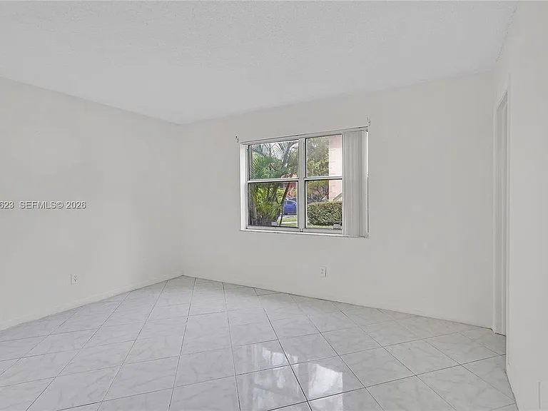 755 NW 104th Ave #104 — Photo 13
