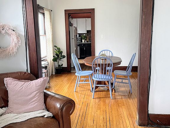 Living Room looking into Dining Room and Kitchen
