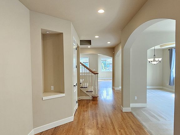 Foyer with hardwood floors.