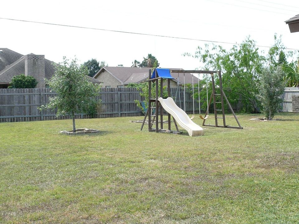 large back yard with privacy fence