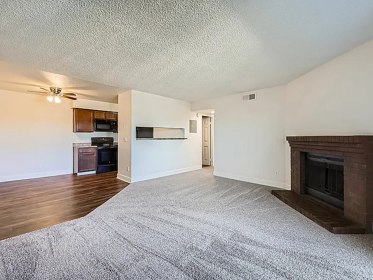 Experience the warmth and elegance of this open-concept living area, perfect for relaxation and entertaining.