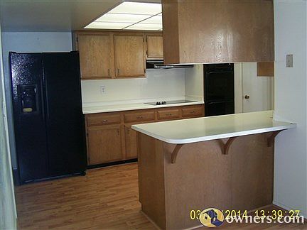 adorable kitchen with breakfast bar