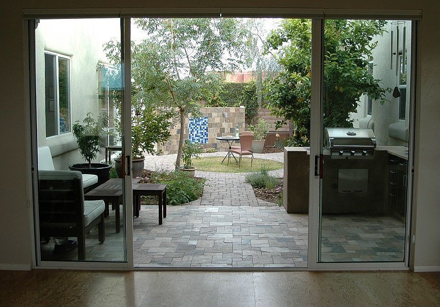 This 12' slider opens the Great room to this 1000sf PRIVATE courtyard.