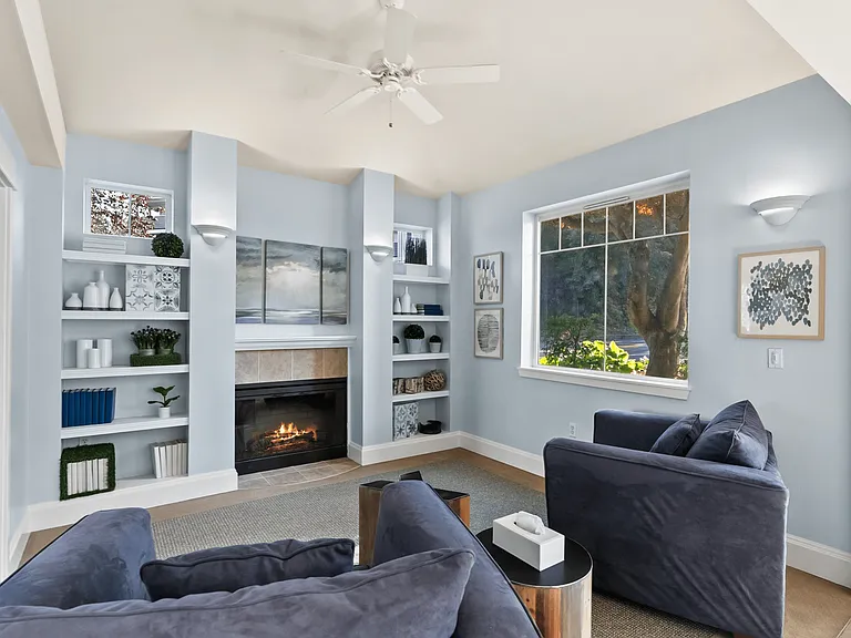 Relax and recharge by the warm fireplace in Alder Court's inviting lounge.