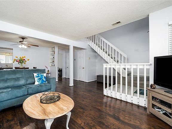 Bright open living room/dining room 