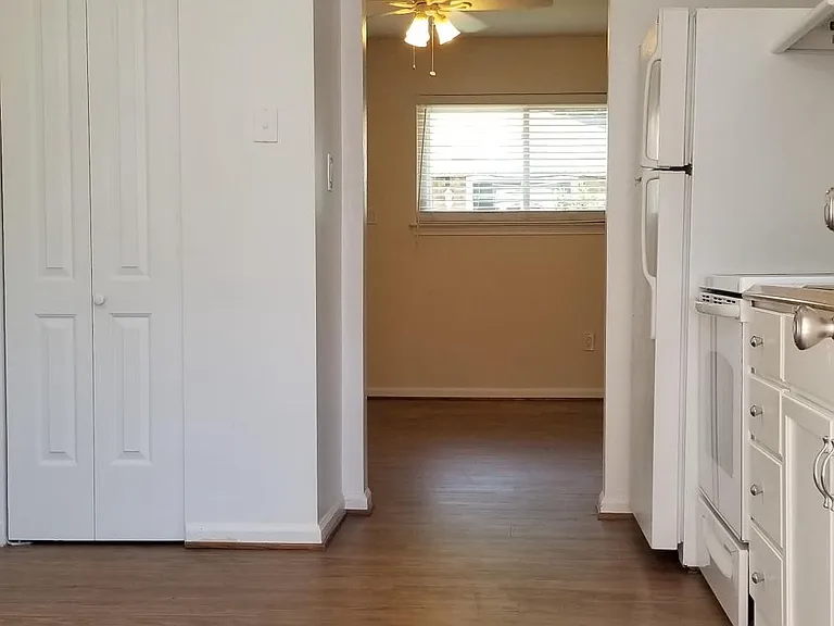 Kitchen looking into living room