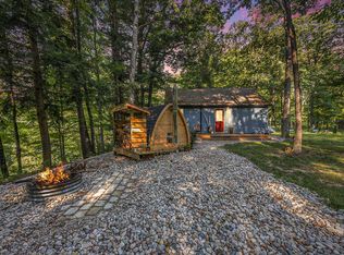 9254 E New River Dr, Howard City, MI 49329