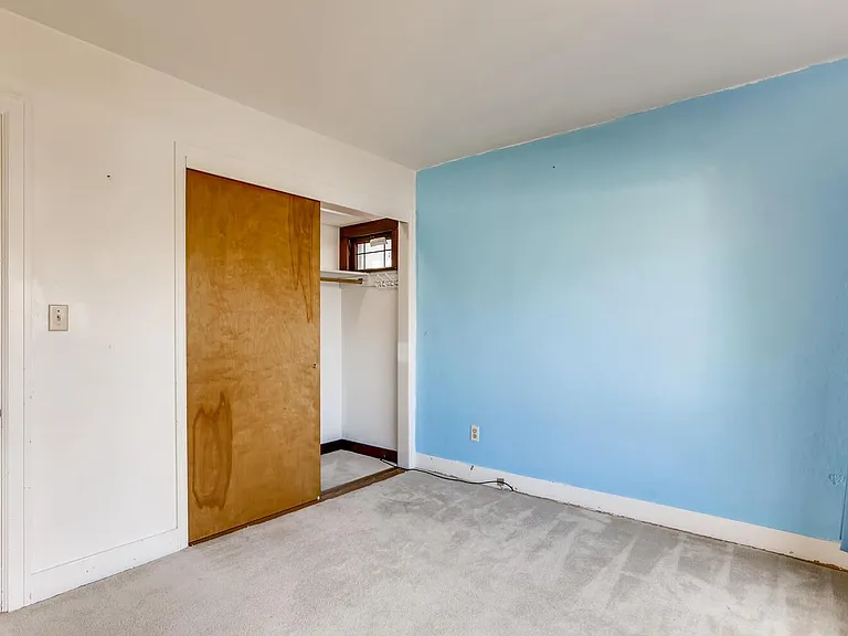 Wall is no longer blue. New white paint inside throughout home.
