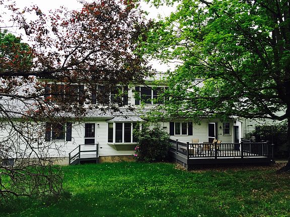 Back view with porch outside the kitchen