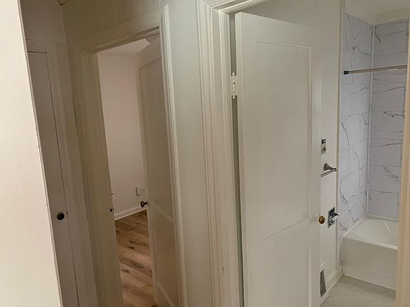 Looking from the living room into hall / bathroom / bedroom 2
