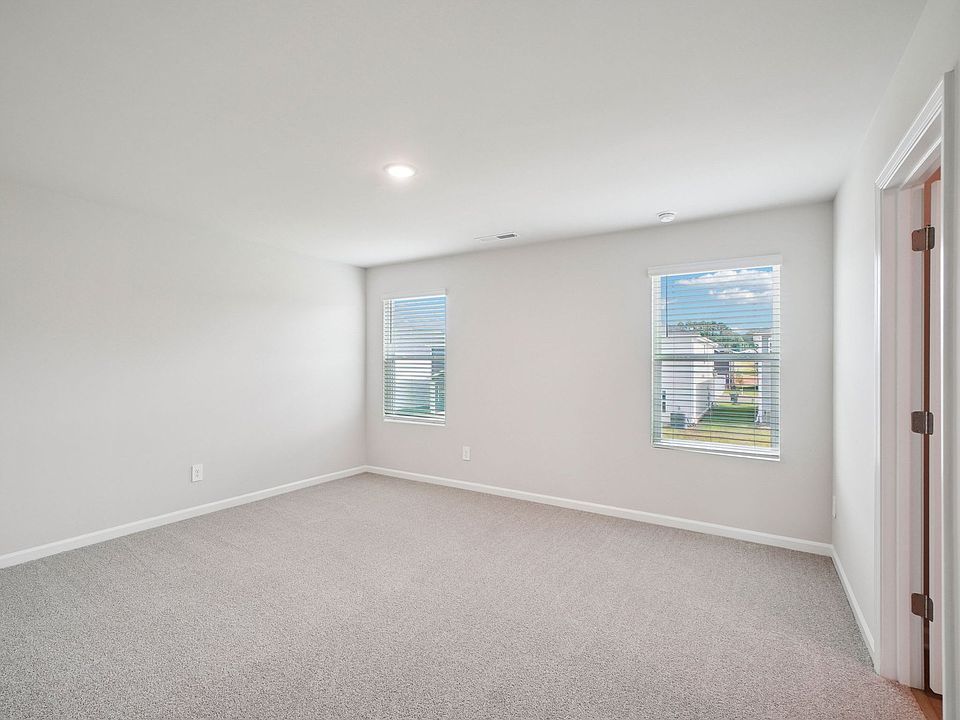 Primary bedroom in the Paisley floorplan at a Meritage Homes community in Garner, NC.