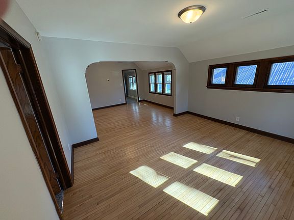 unit living room and dinning room as photographed from front entry door