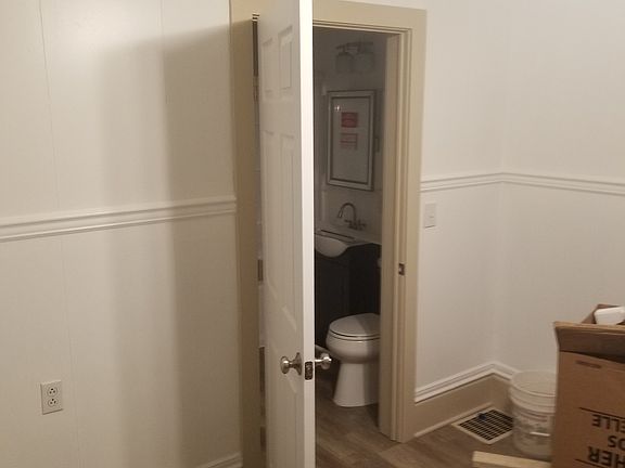 B unit kitchen door to bath