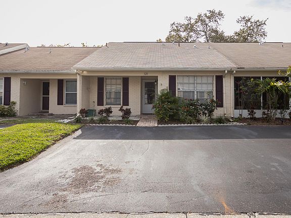 Front entrance and two parking spots
