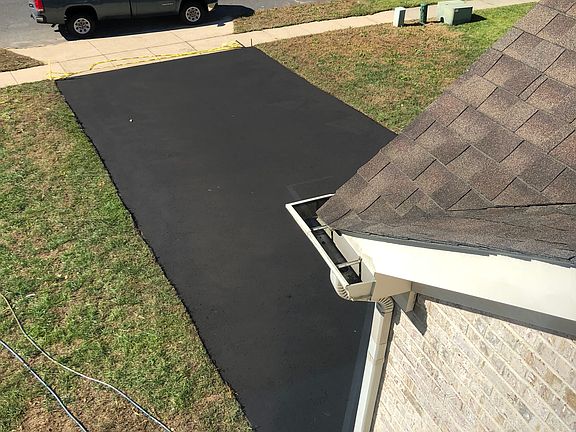 Newly seal coat the driveway