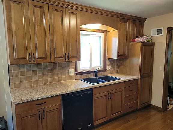 kitchen.  corian counters. cabinetry