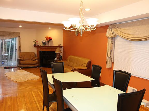 Spacious Dinning room leads into living room. Great for large family parties