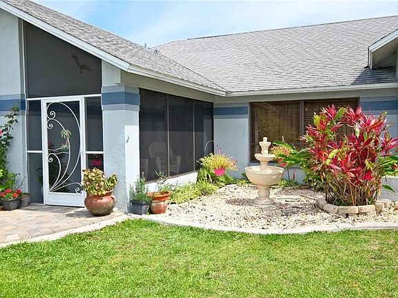 Front entry has a screened in porch perfect for letting the cross breeze into the house