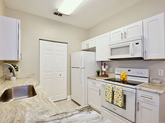 4th image of 860 Grand Regency Point #205-9