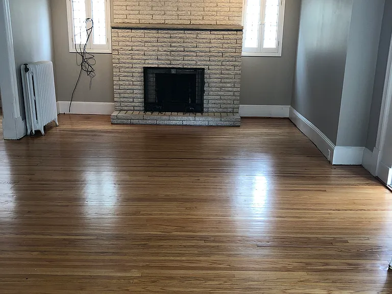 Large Living Room - hardwood floors throughout the unit with the exception of the kitchen and bath which are suited with luxury vinyl.