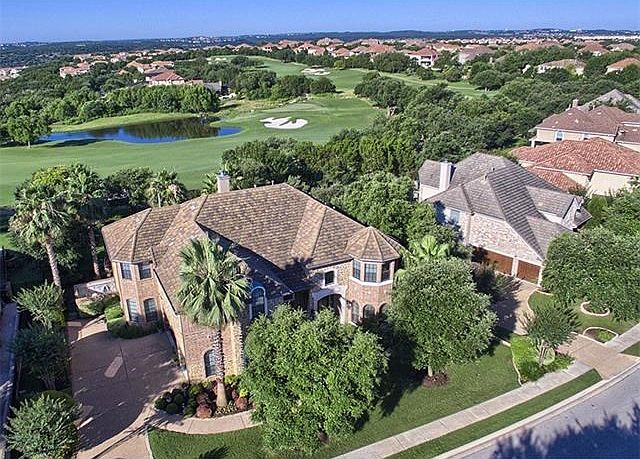 Spectacular Drees custom home with incredible view of the UT Golf Course and Hole 13!