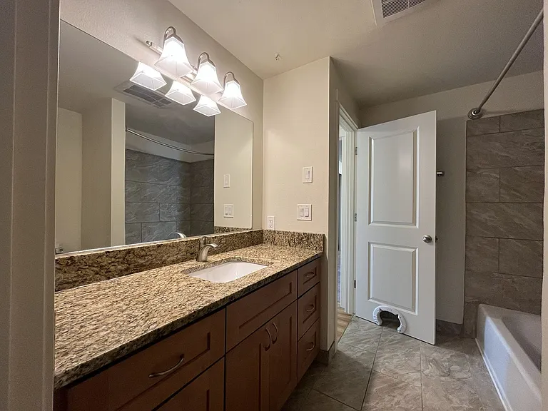 Bright and Airy Home with Stainless Steel Kitchen, Vaulted Ceilings & Washer + Dryer — Photo 35