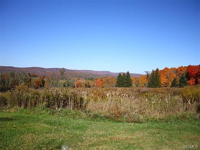 Experience stunning westerly views on 23 mostly cleared acres.