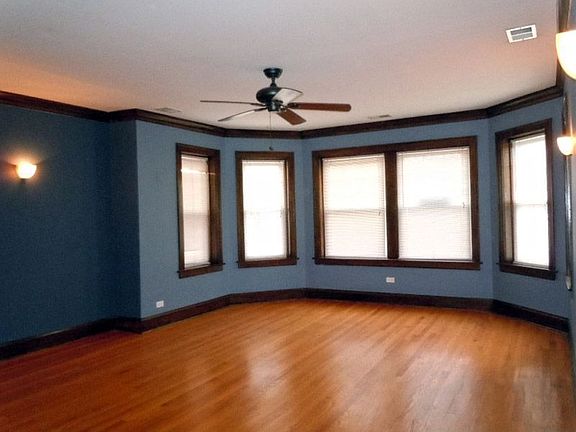 Living Room with Generous Natural and Artificial Lighting 