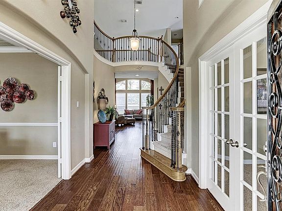 Once you enter the etched glass/wood door and see the amazing dÃ©cor and stairway, you know the home is going to be gorgeous.