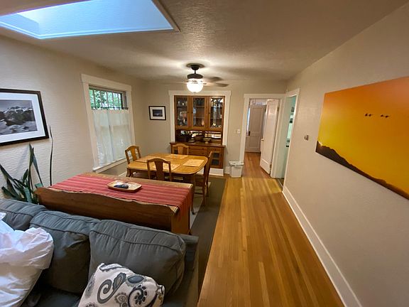 Open concept living room/dining room as seen from the front door