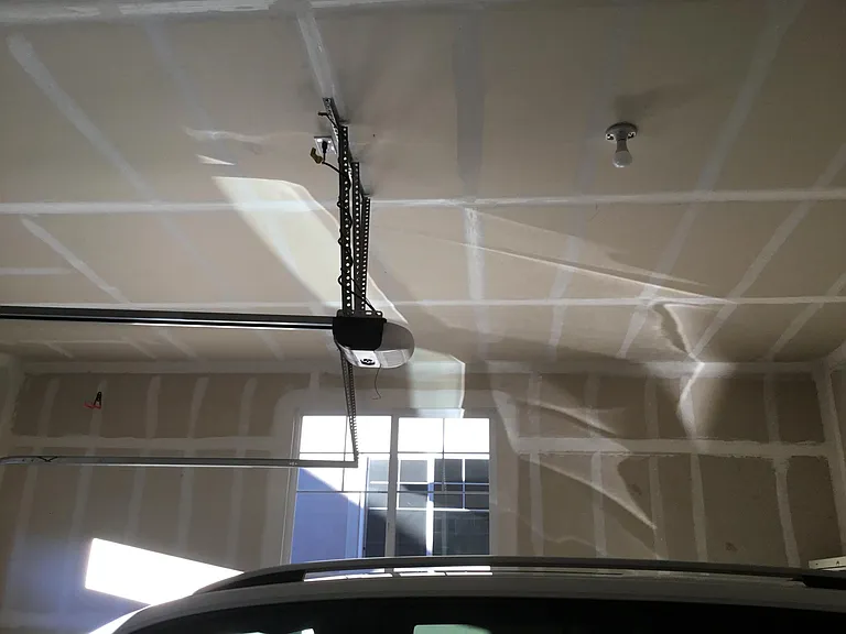 2 car garage, fits Atlas SUV with some room around it and equal 2nd car