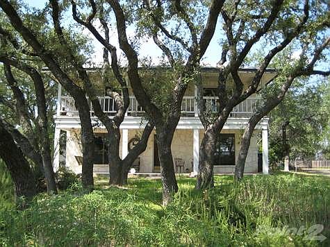 Beautiful White Stone with Oak Trees Everywhere!