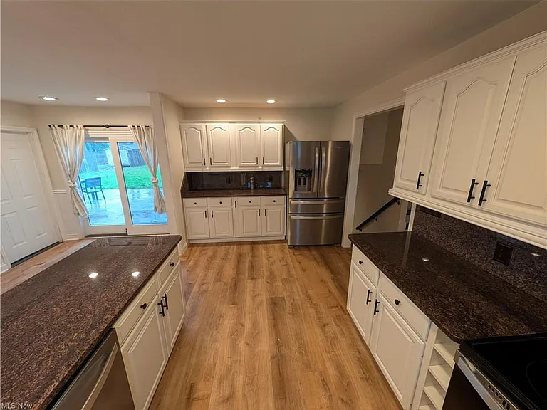8645 Courtland Dr — Photo 3