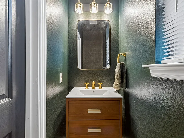 Half bathroom is downstairs perfect for guests.