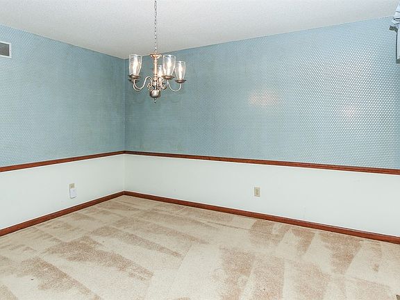 newer carpet....and let's talk about the elephant in the room, wallpaper.  This house has some and it can be removed more cheaply  than many of the home improvements (HVAC, roof, windows, etc.) that are already done!