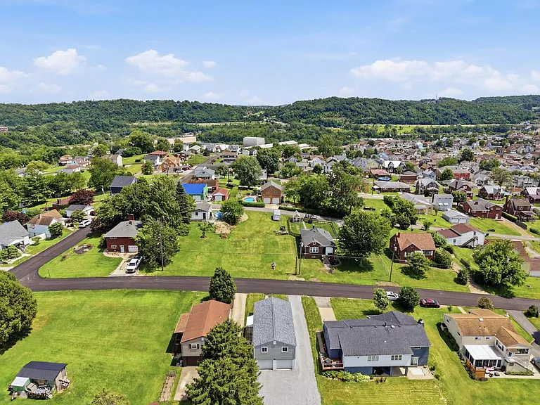 Drone shot - facing the back of the property.