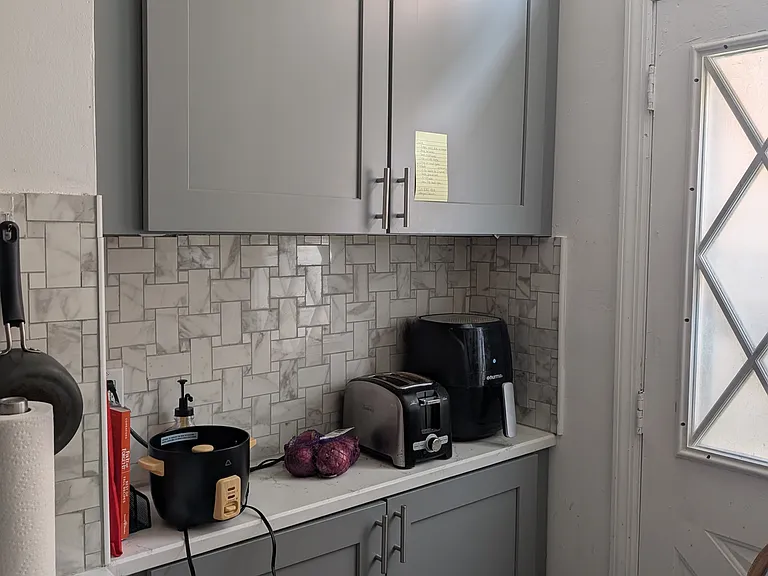 Extra Storage in Kitchen across from Sink (next to Side Door Entrance/Exit)