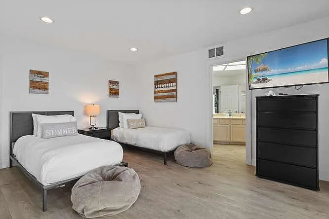 Rest and relax in the comfort of our second bedroom's twin beds.
