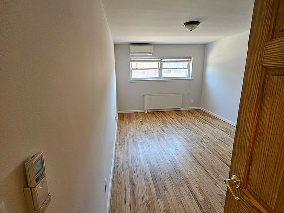 5th image of 6335 75th Pl Floor 1