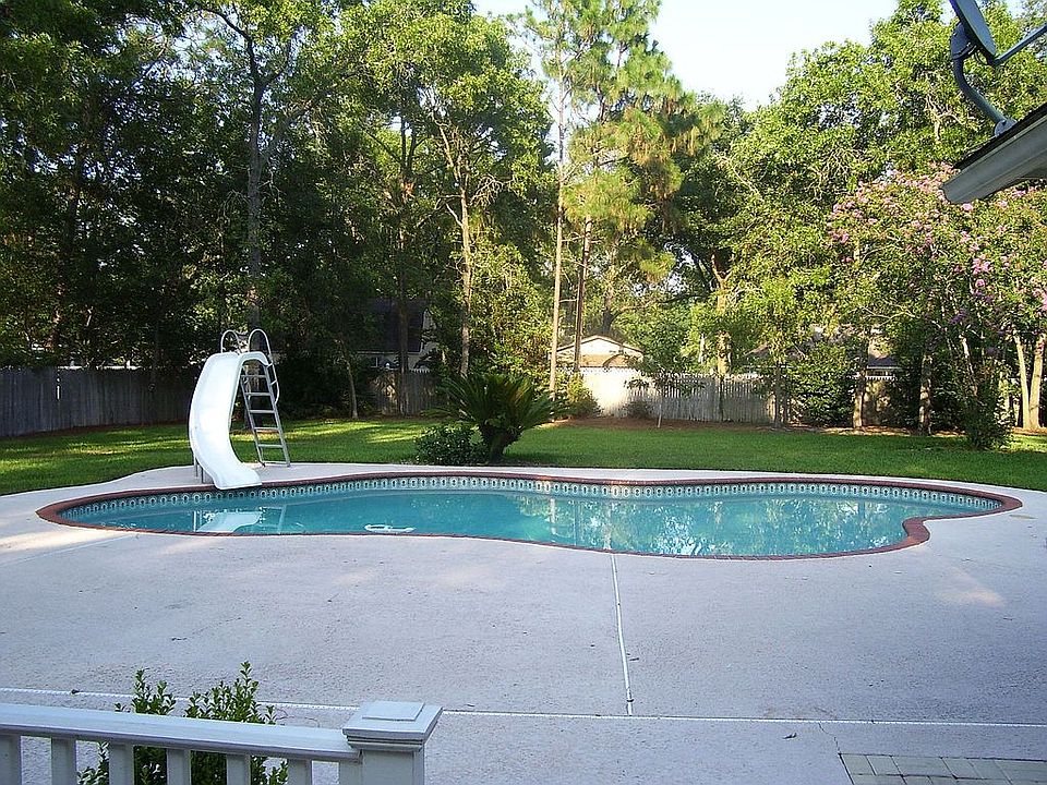 Back yard and deep pool with slide!