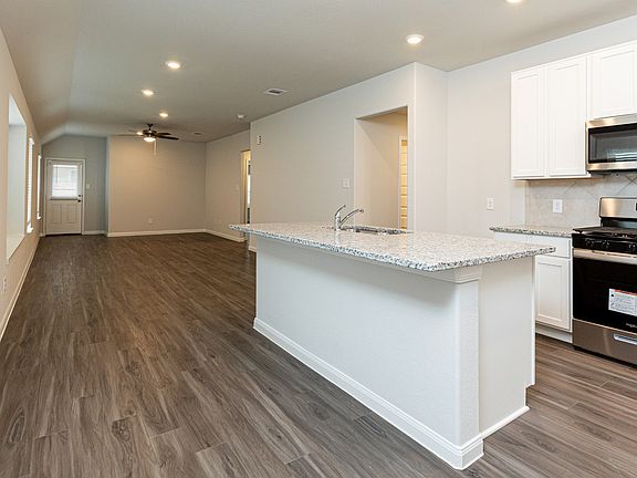 Dining Area to Kitchen and Family Room