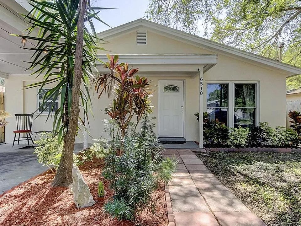 New roof and exterior paint give this cute South Tampa home a fresh feel under the giant shady oak tree. Quiet South Tampa neighborhood less than two miles from MacDill AFB and walking distance to Gadsden Park.