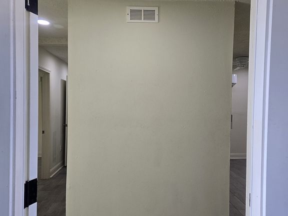 Kitchen and Living room on right.
2 bedrooms, bath and laundry room on left