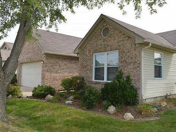 Exterior Front. Lots of landscaping touches around home.