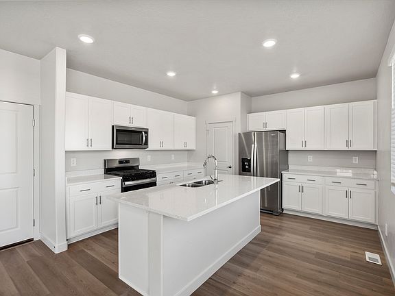 The Cottonwood floorplan interior image taken at a Meritage Homes Community in Tooele, UT.