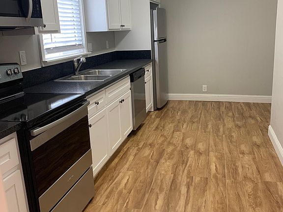 Eat In Kitchen with custom cabinets