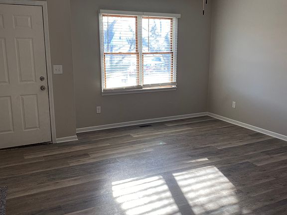 Living room open to the kitchen.