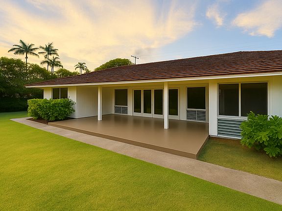 Golden-hour serenity: a classic island home framed by soft skies, lush greenery, and an inviting lanai perfect for sunset gatherings. Growing up this house was the center of my universe.