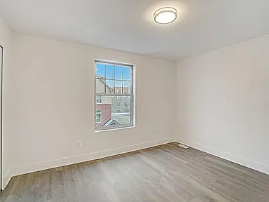 2nd bedroom with large closet, ample wall space and adjacent to hall bath