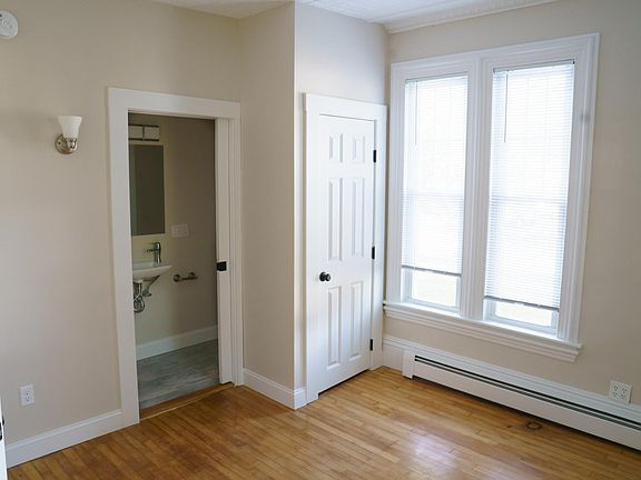 Master bedroom with an attached bathroom
